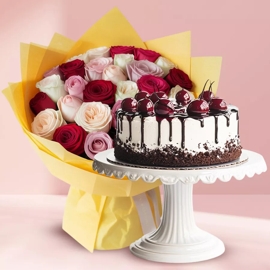 A vibrant bouquet of 24 mixed roses alongside a delicious 1Lb Black Forest cake, perfect for celebrating special moments.