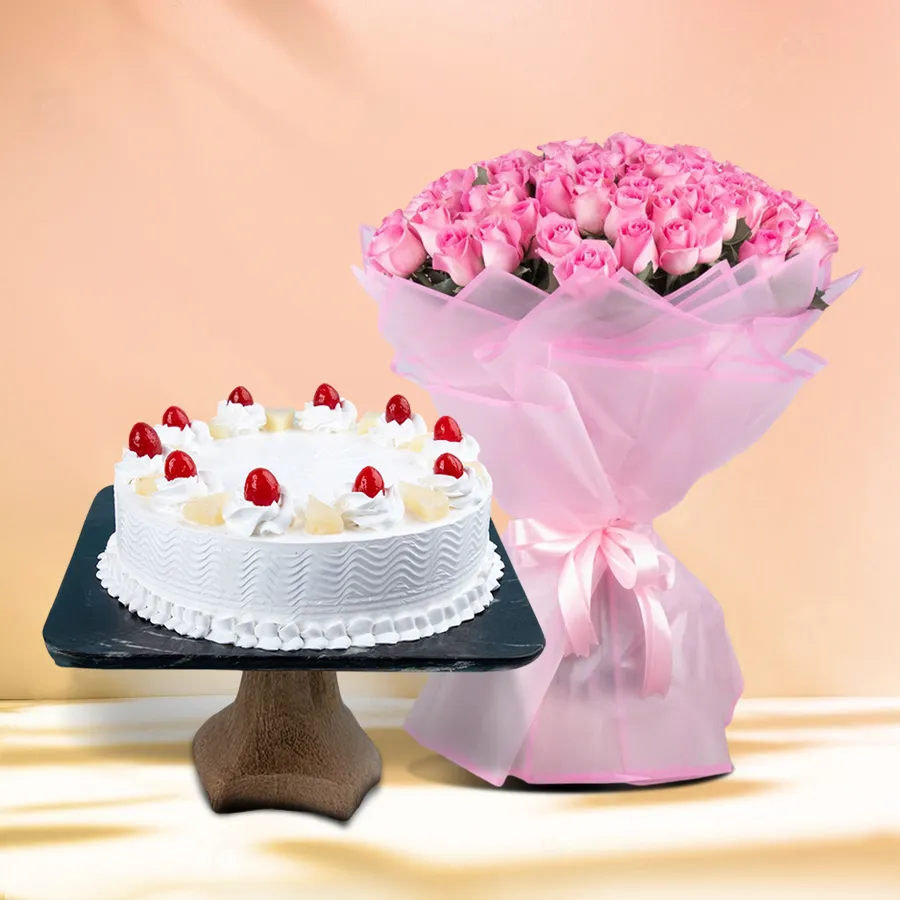 Delightful pineapple cake from 5 Star Bakery with a bouquet of 12 roses, perfect for gifting and celebrating special moments.