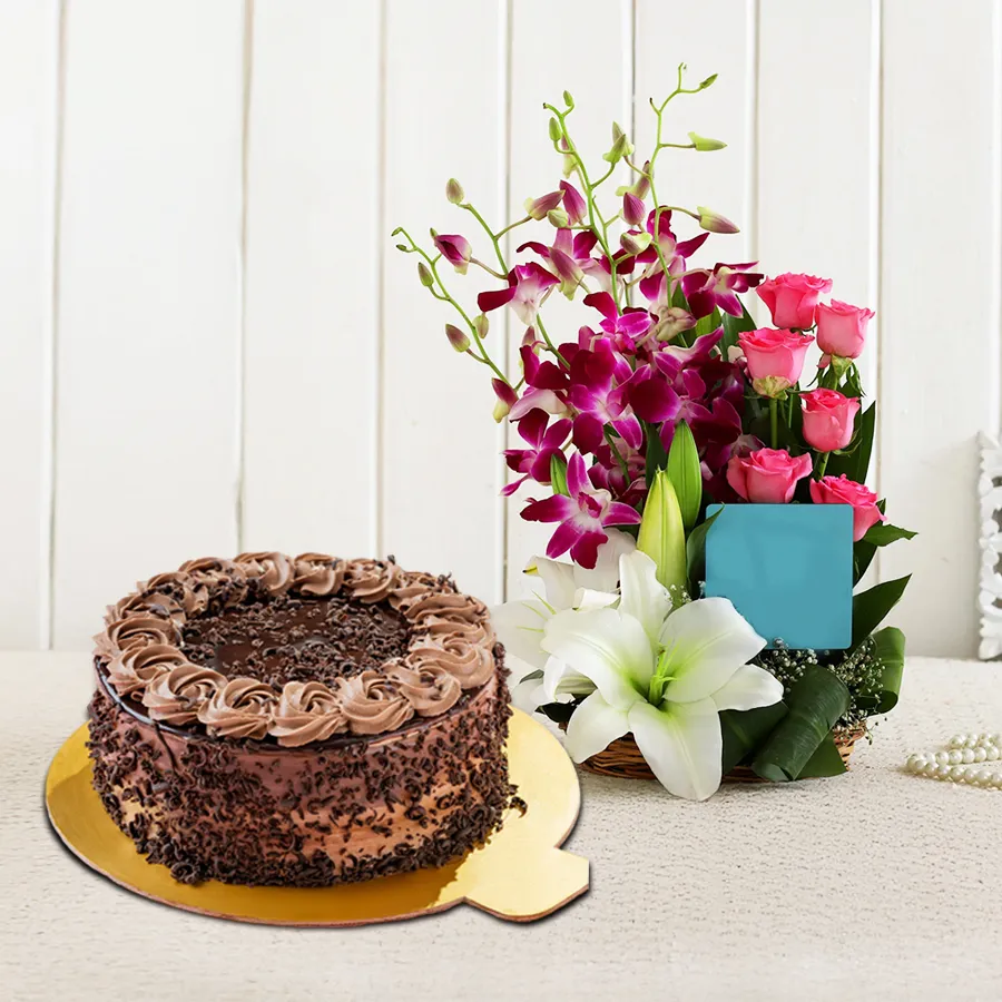 A stunning gift featuring a 1 kg chocolate cake from 5 Star Bakery alongside a vibrant arrangement of 24 assorted flowers.
