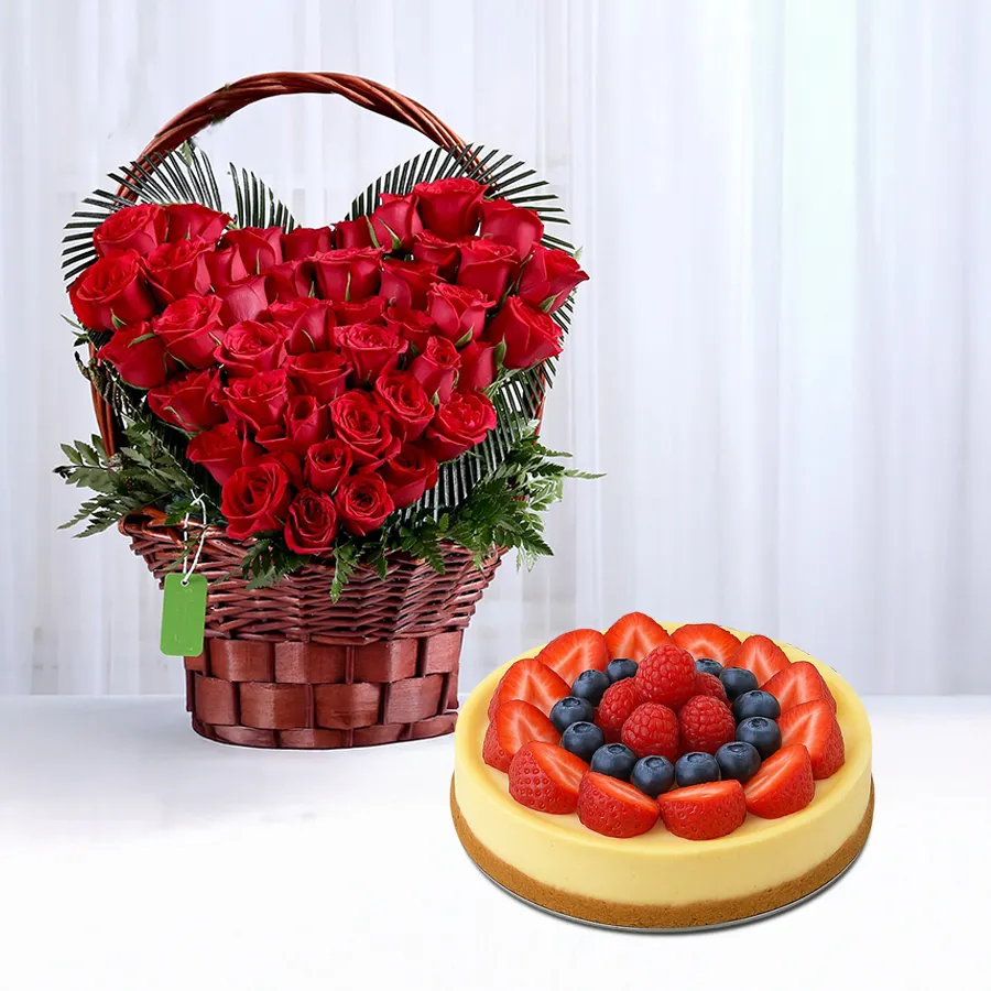 A romantic cheesecake from 5 Star Bakery, beautifully accompanied by a heart arrangement of 24 red roses, perfect for special occasions.
