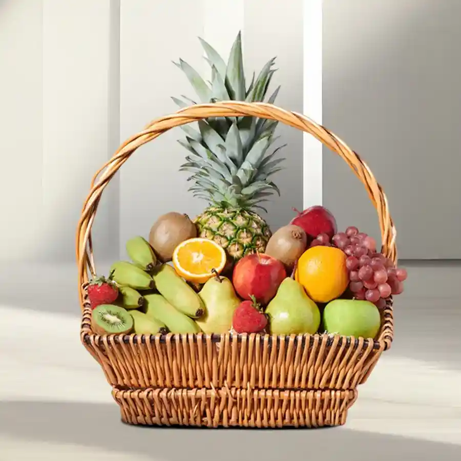 A vibrant 5 Kg basket overflowing with fresh Bananas, Oranges, and Apples, showcasing a colorful assortment of juicy fruits.