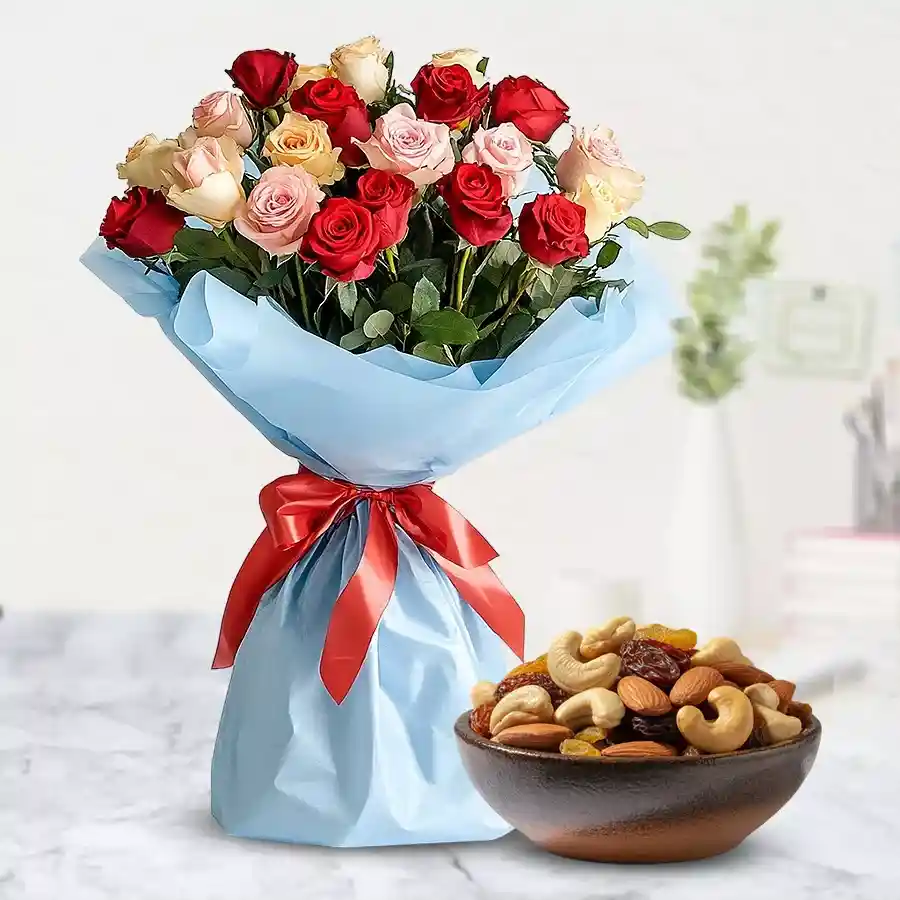 Exquisite hamper featuring assorted dry fruits and a bouquet of 24 colorful roses, perfect for Mother's Day.