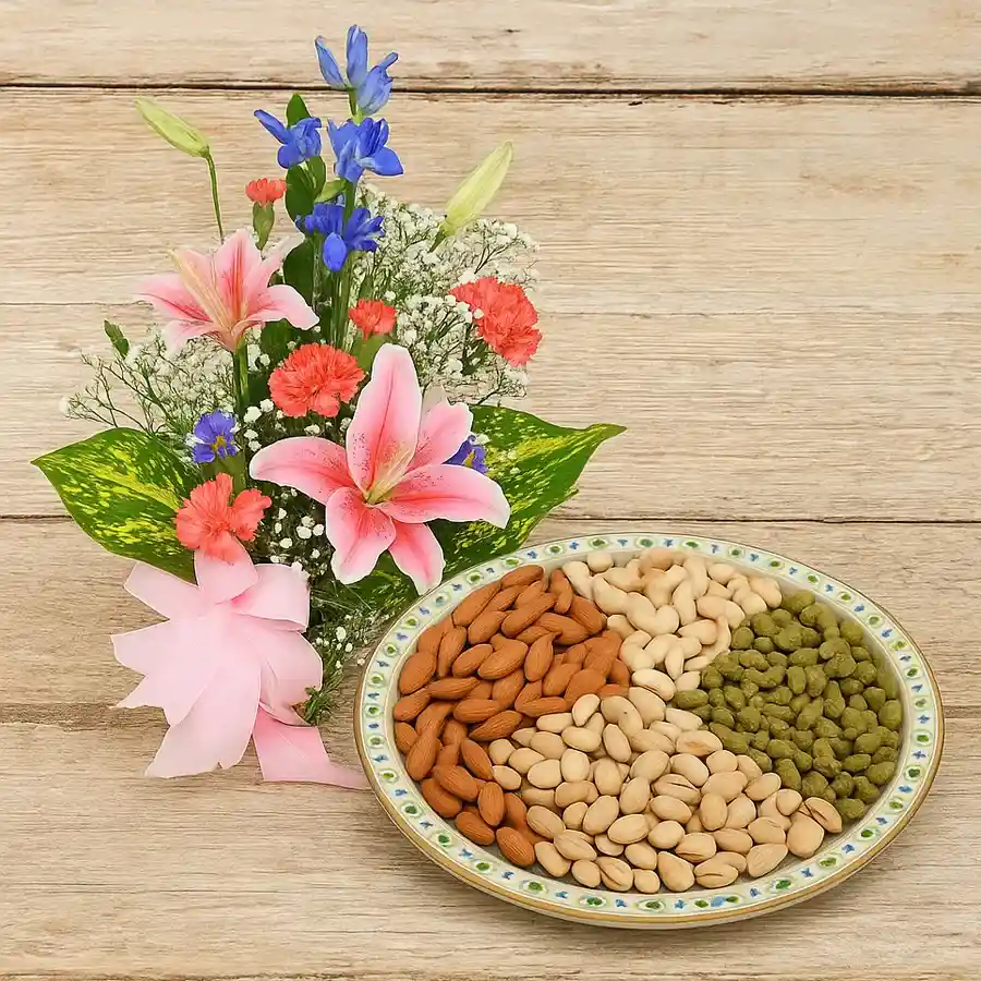 Beautiful bouquet of seasonal flowers with assorted dry fruits for Mother's Day.