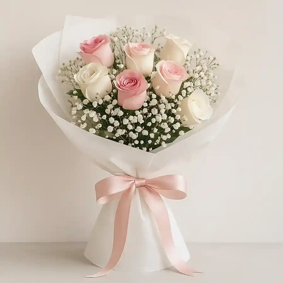 A beautiful bunch of 10 Pink and White Roses symbolizing love and elegance.