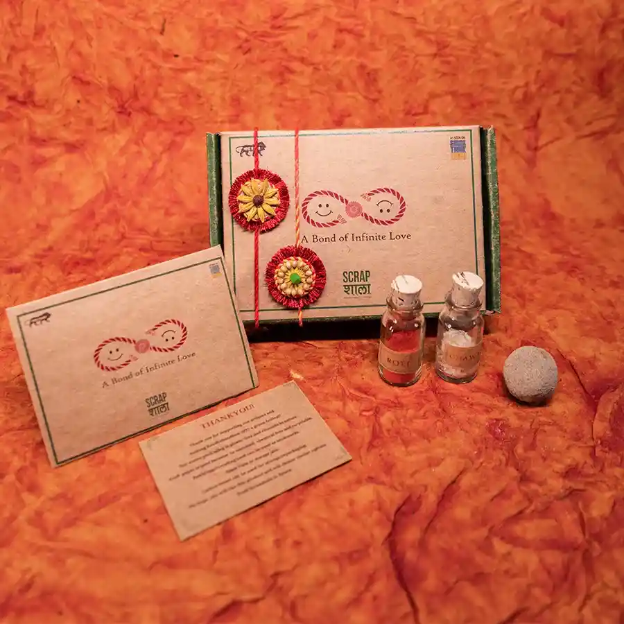 Handmade Eco Friendly Rakhi Duo with plantable rakhis and decorative jars.