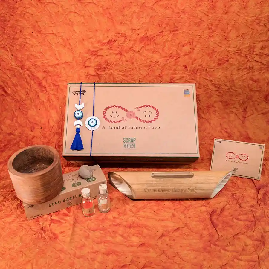 Eco-Rakhi Love and Growth Set featuring plantable rakhis, wooden planter, and eco-friendly gifts for Raksha Bandhan.