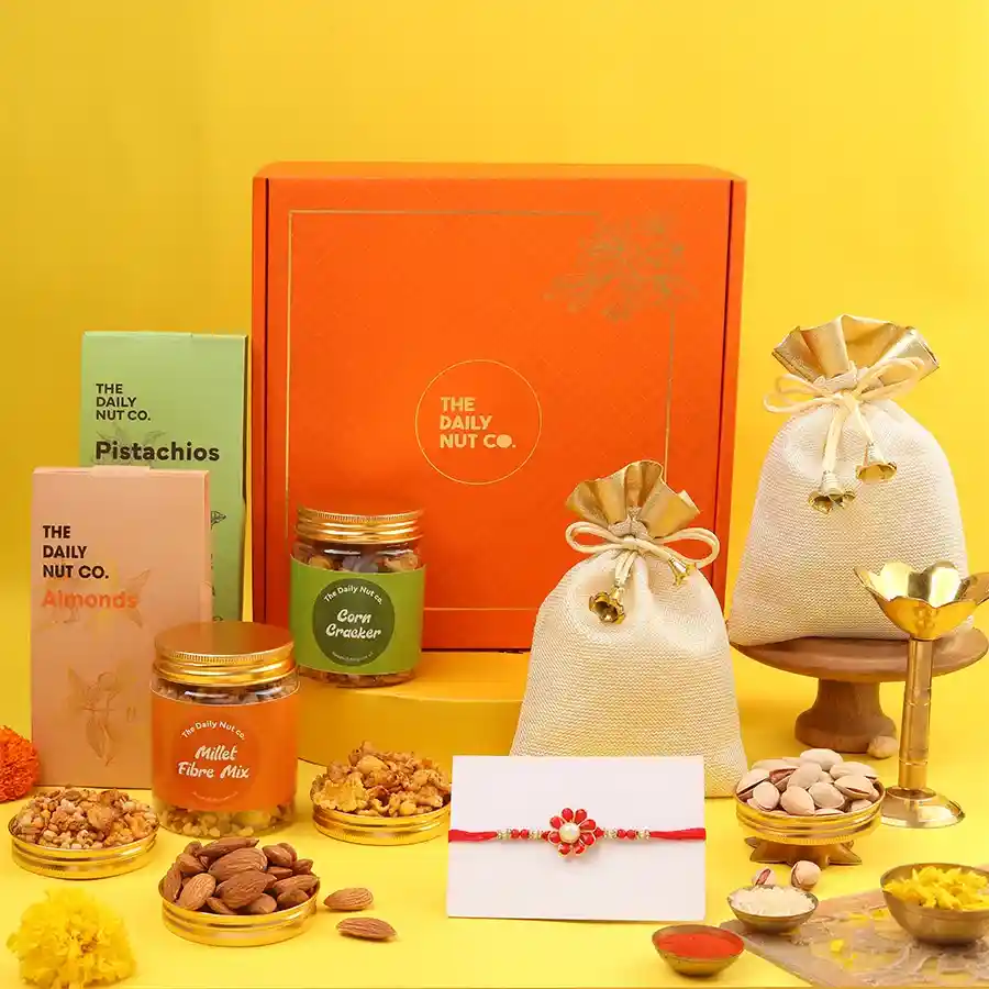 Delightful Rakhi Treats Gift Set featuring nuts, cookies, and Rakhi essentials.