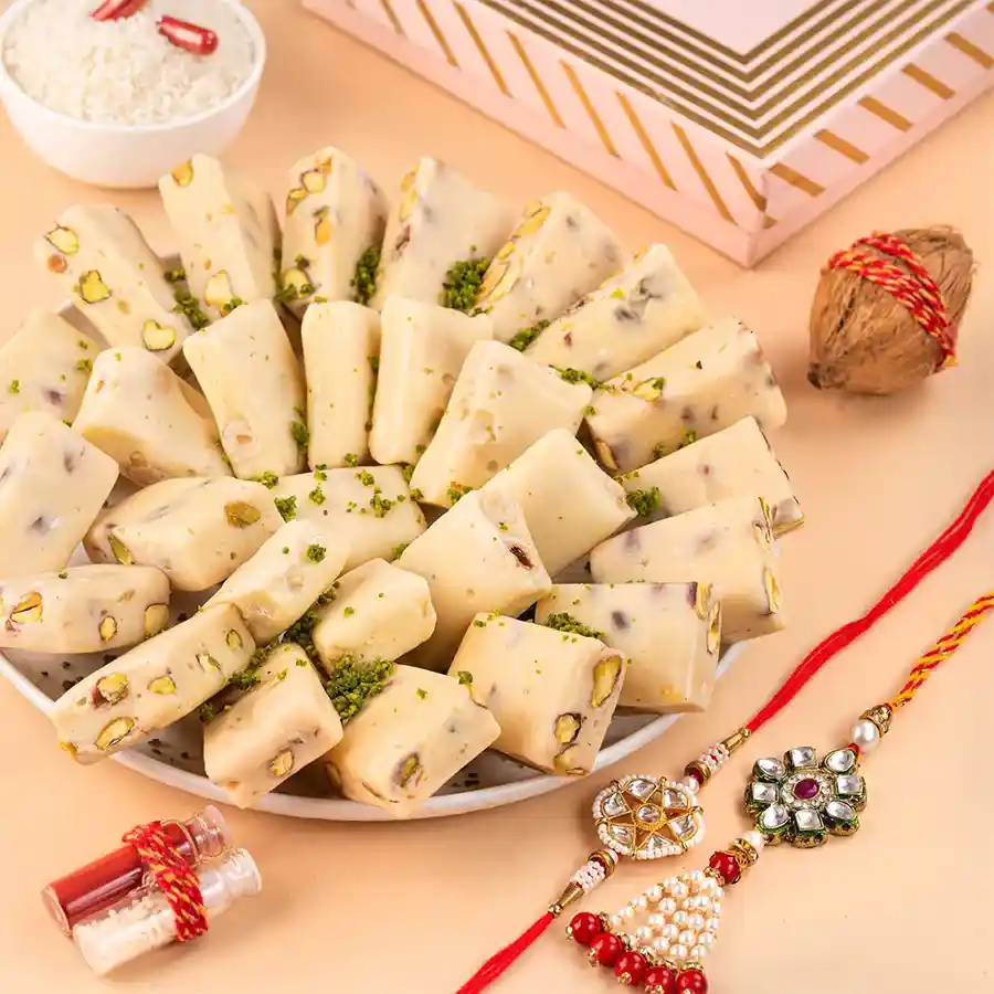 Sweet Elegance Rakhi Gift Box featuring chocolate nougat and Kundan Rakhis.