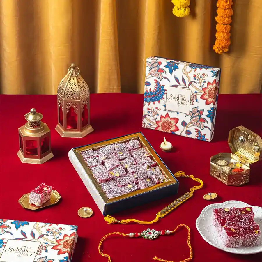 Pomegranate Delight & Rakhi Duo featuring Turkish delight and two Rakhis.