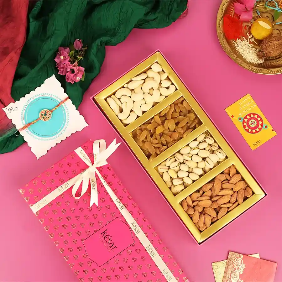 Classic Nutty Rakhi Gift Set with nuts and a red flower Rakhi in a gift box.