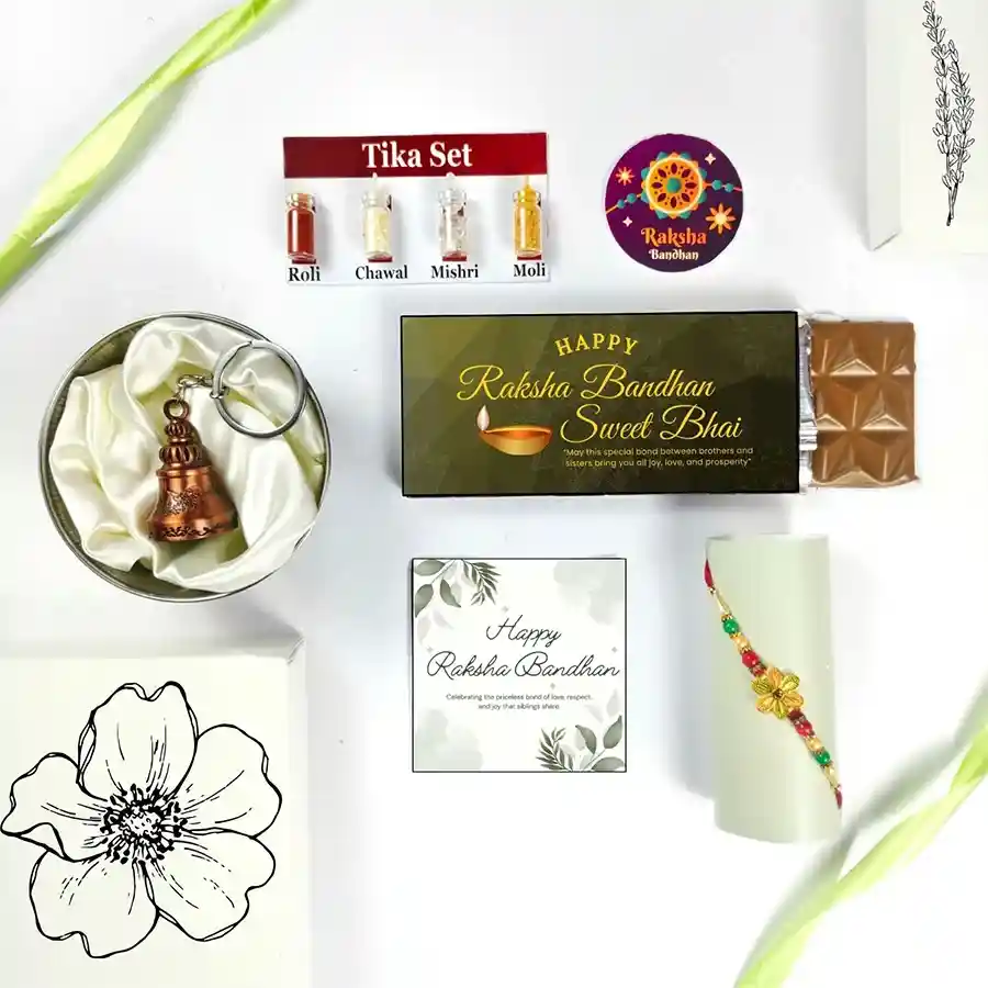Cherished Rakhi Bond Gift Set featuring Rakhi, chocolate bar, guardian bell, greeting card, and Tika set.