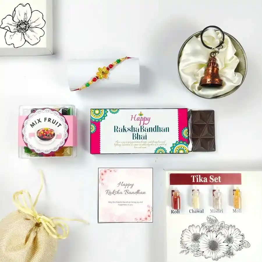 Traditional Rakhi Gift Set featuring Rakhi, chocolate, fruits, and more in a charming jute potli.