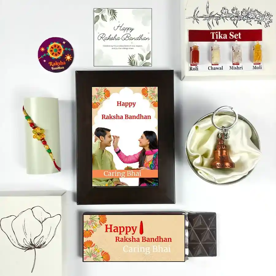 Sibling Love Rakhi Gift Set with chocolate bar, photo frame, Rakhi, Tika set, guardian bell, and greeting card for Raksha Bandhan.