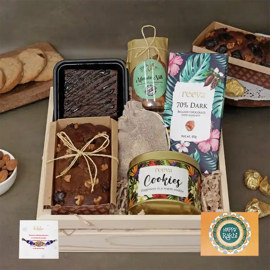 A delightful Sweet Treats & Rakhi Bliss Set featuring chocolates, cookies, and nuts, perfect for festive gifting.