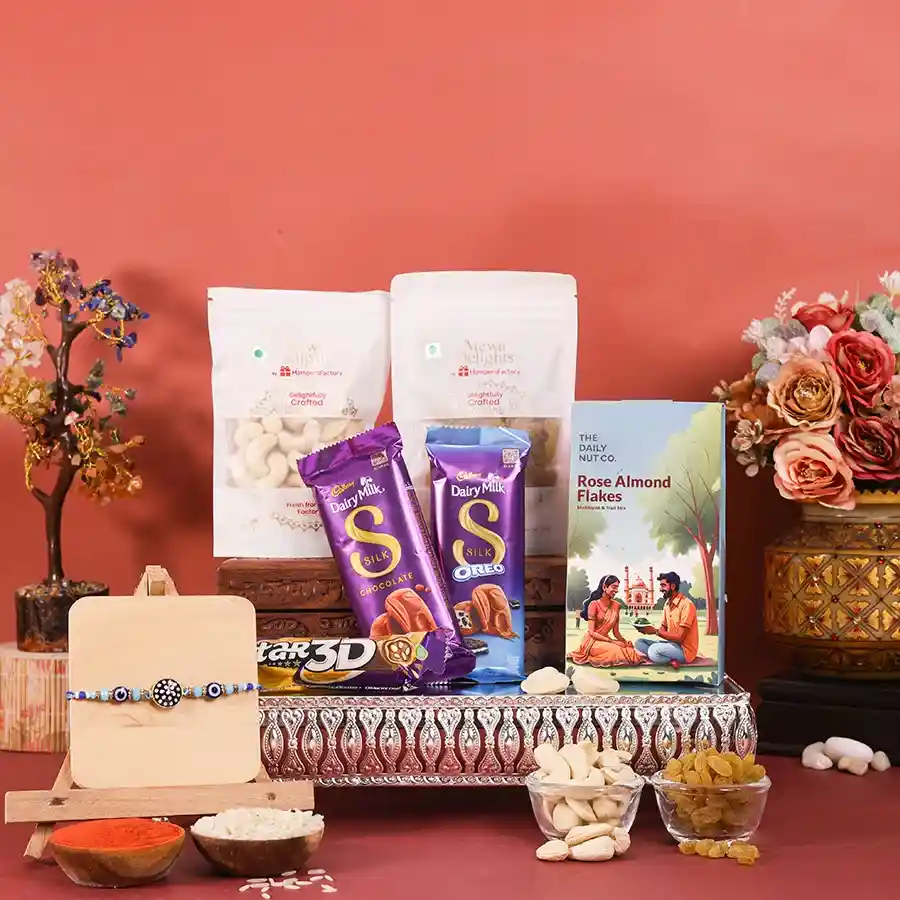 Charming Rakhi Celebration Set with Evil Eye Rakhi, premium nuts, chocolates, and a reusable gift box.
