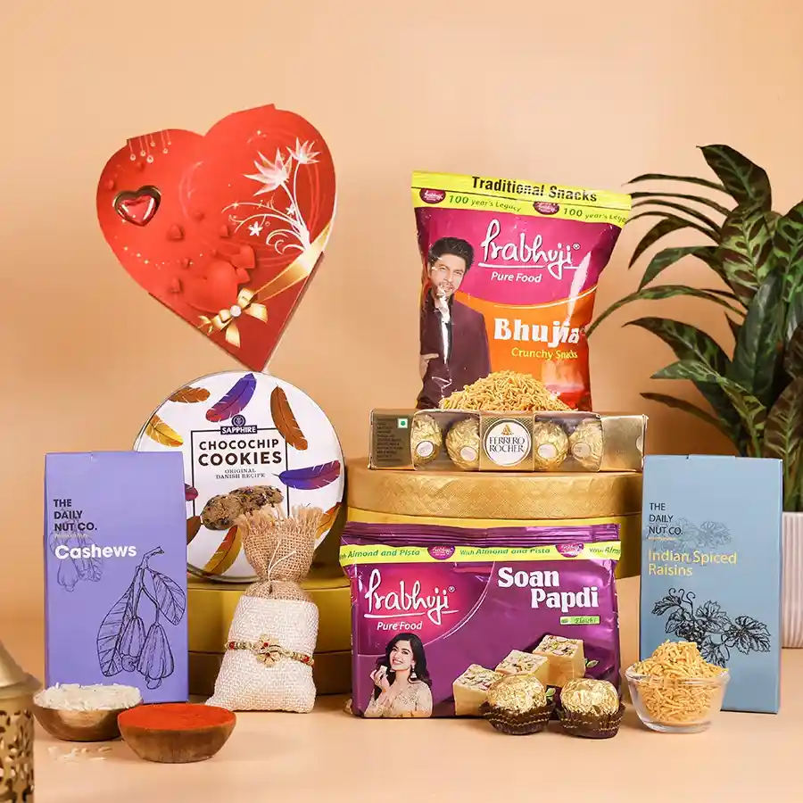 Joyful Rakhi Celebration Hamper with designer rakhi, treats, and card.