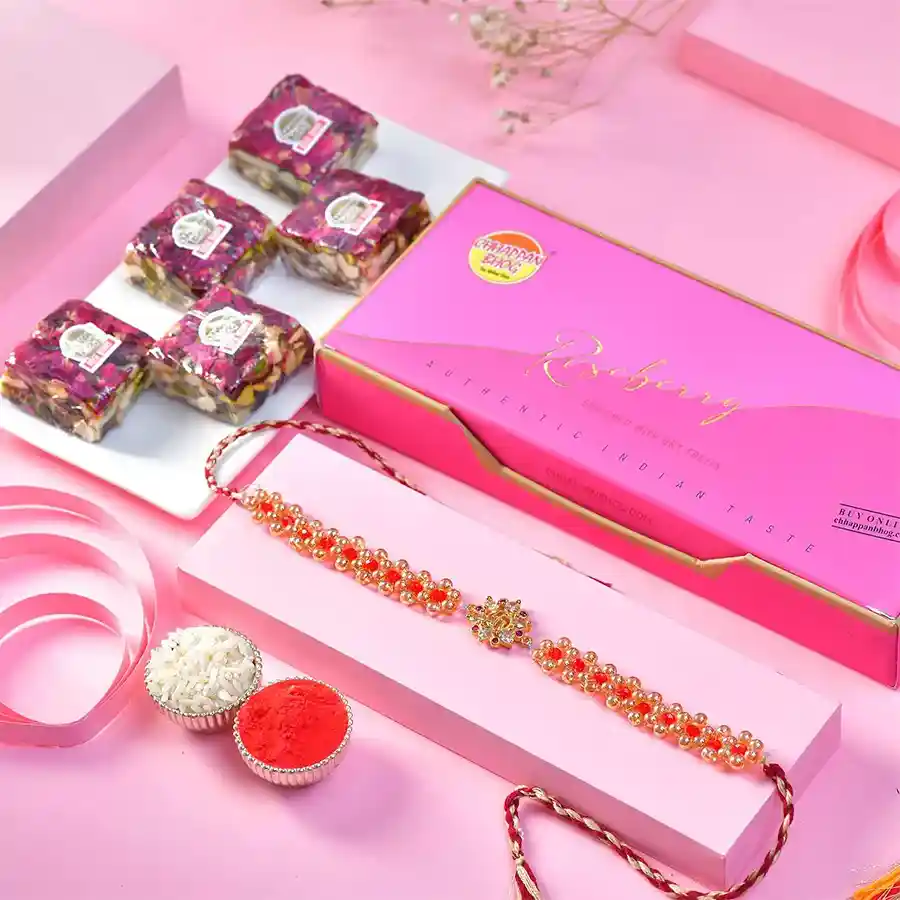 Timeless Rakhi with Delectable Treats Combo -- bracelet-look Rakhi with five Roseberry Bites and Roli Chawal Card, perfect for sibling celebrations.