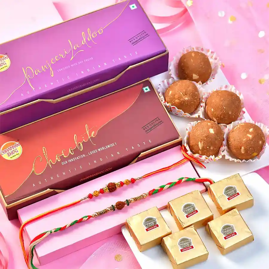 Rakhi Treasures & Sweet Indulgence Combo featuring Rudraksha Rakhis and delicious sweets in a transparent gift bag.