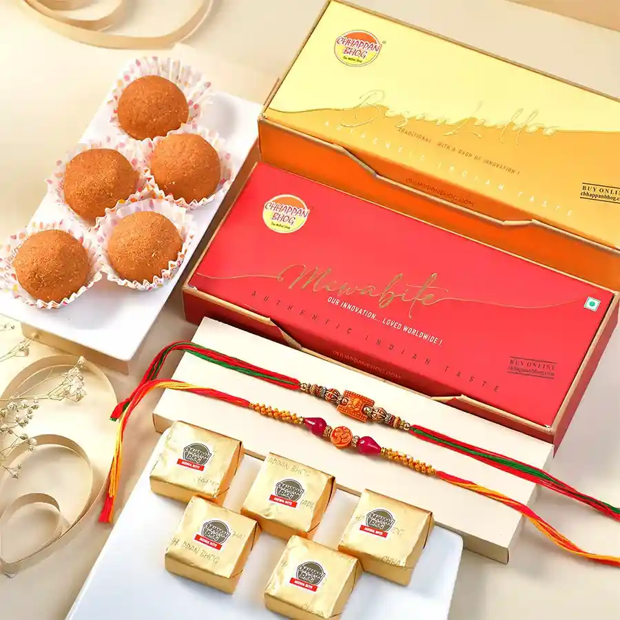 Festive Rakhi & Delectable Delights Combo and delicious Chappan Bhog sweets in a transparent gift bag for festive celebrations.