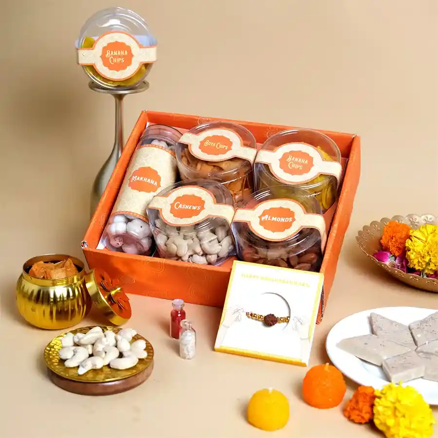 Crunchy Delights Rakhi Gift Set with snacks and a Rudraksha Rakhi on a festive tray.