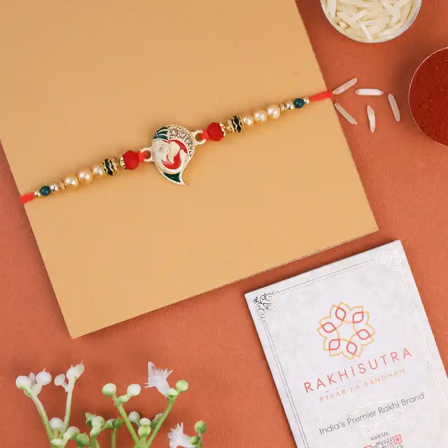 Sacred Ganesh Rakhi gift set with Roli Tika and card