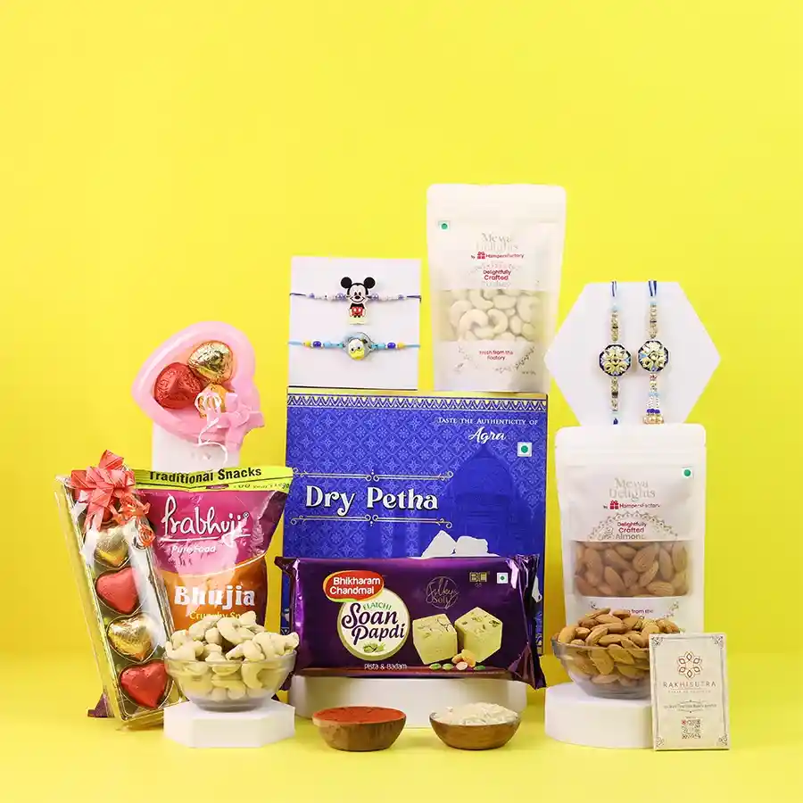 Colorful Rakhi gift hamper with traditional treats