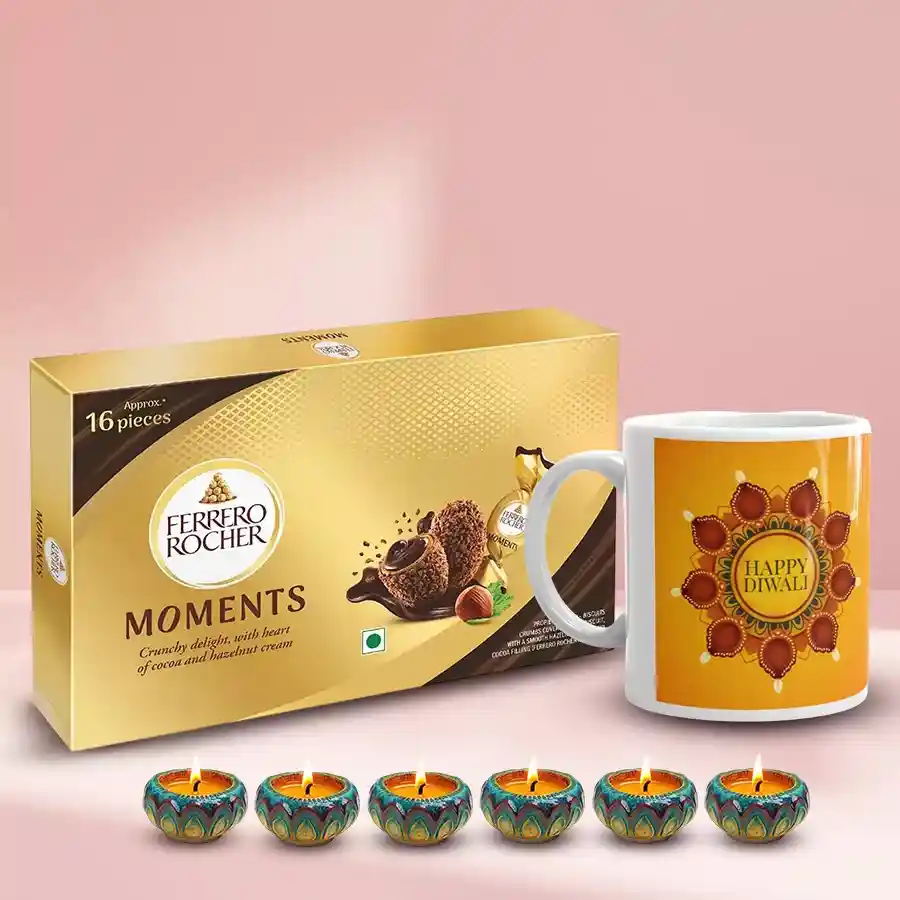 Personalized Diwali message mug with Ferrero Rocher chocolates and decorative diyas.