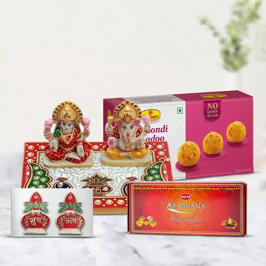 Auspicious Diwali Pooja Special Kit with Marble Choki, Laxmi and Ganesh Ji, Pooja Samagri, Haldiram Boondi Ladoo, and Subh Labh sticker.