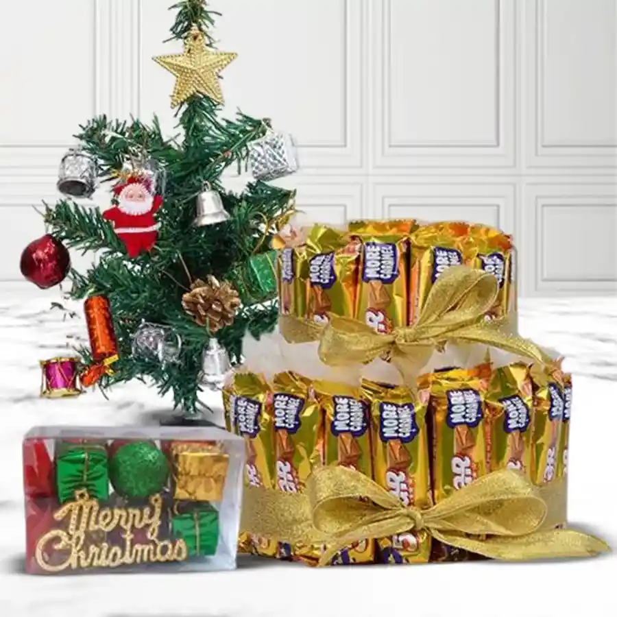 Two-tier arrangement of 24 Cadbury Five Star bars on a decorated 1-ft Christmas tree.