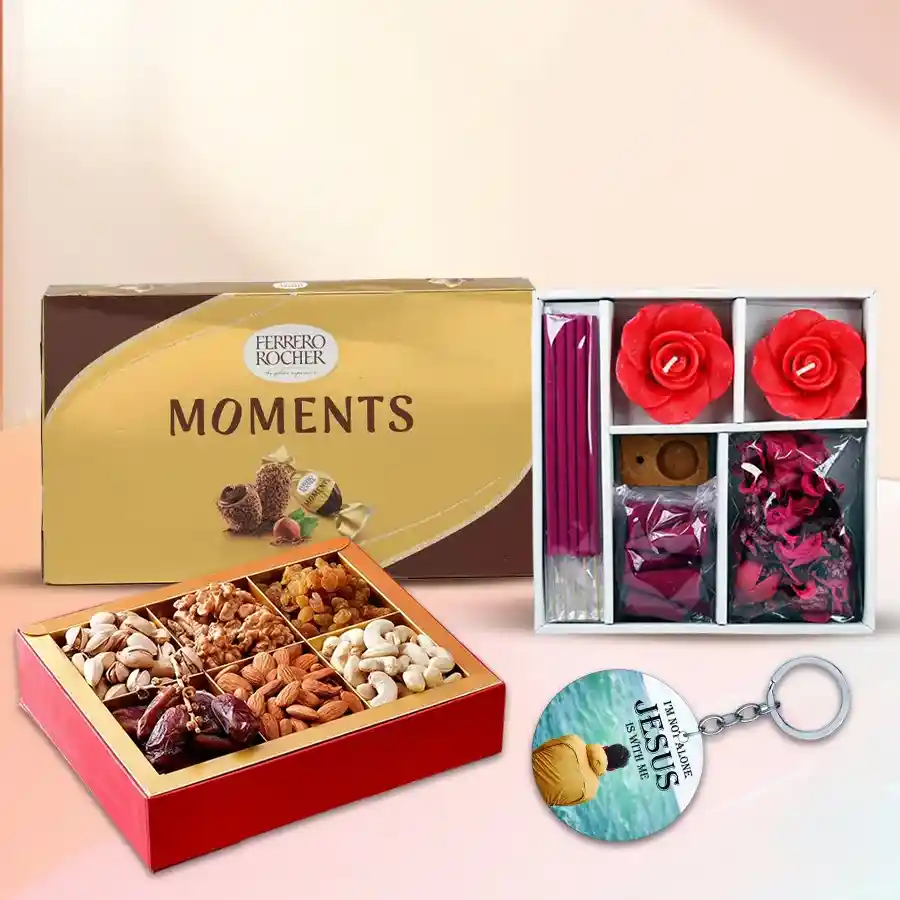 Exquisite Dry Fruits and Assortments Gift Hamper featuring almonds, pistachios, dates, dried kiwi, amla candy, Ferrero Rocher chocolates, a personalized keychain, an iris rose candle, a potpourri set, and a stylish wooden tray.