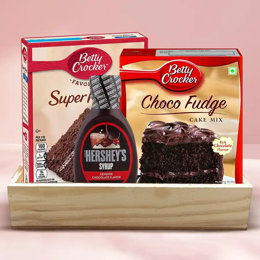 Mouth-Watering Chocolate Cake Gift Hamper featuring cake mix, Choco Fudge, Hershey's Chocolate Sauce, and a wooden tray