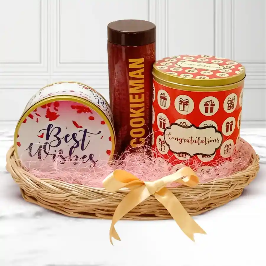 Lip Smacking Cookies Tin for Christmas with assorted cookies and homemade chocolates in a festive arrangement