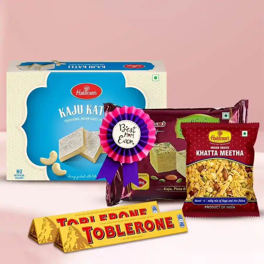 Delicate Savory Pleasure Gift Hamper with sweets and a badge for Mother's Day