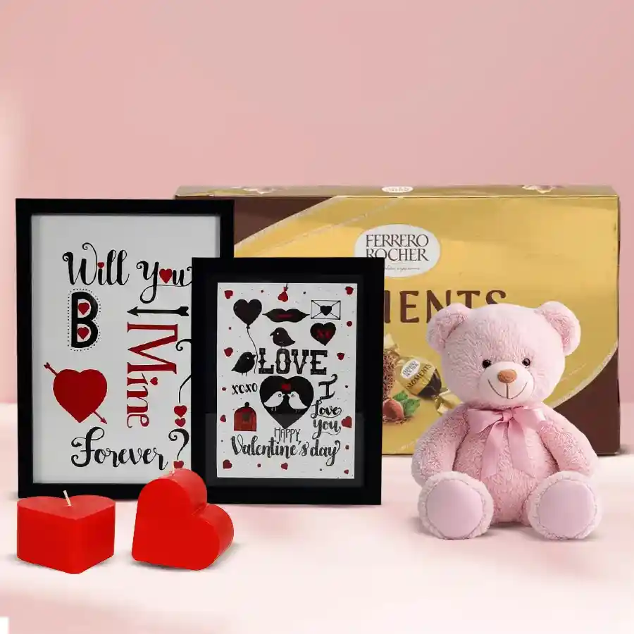 Fabulous Valentine's Day Moments Gift Hamper featuring love message frames, heart-shaped candles, a teddy bear, and Ferrero Rocher chocolates.