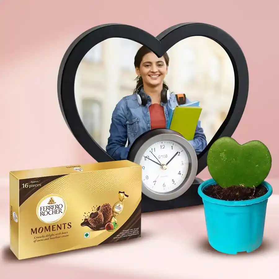 Marvelous Personalized Gift Hamper for Women's Day featuring a personalized magic heart lamp clock, a Hoya heart plant, and Ferrero Rocher chocolates.
