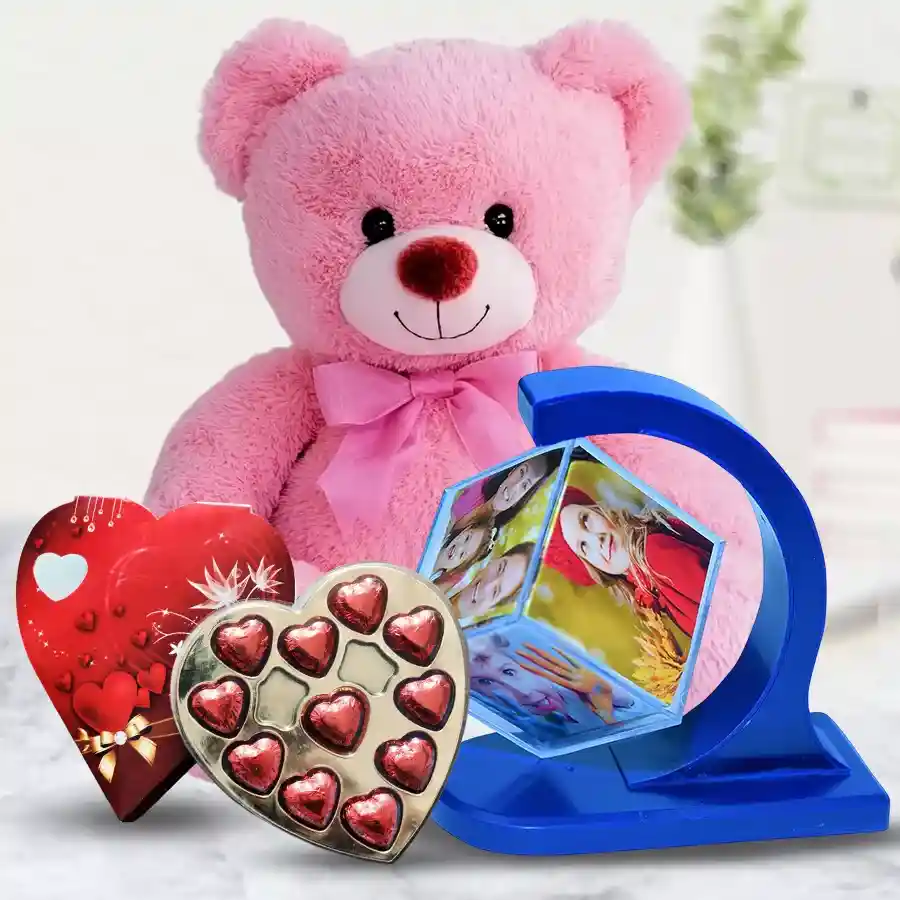 Personalized photo revolving stand featuring a favorite photo, a 24 cm love teddy, and heart-shaped chocolates.