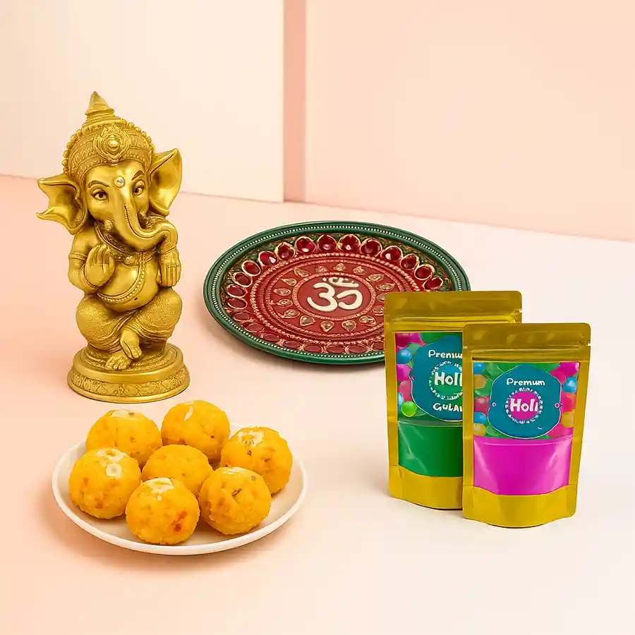 Pious Ganesha idol with pooja thali, Haldiram Boondi Laddu, and herbal gulal packets for Holi celebration