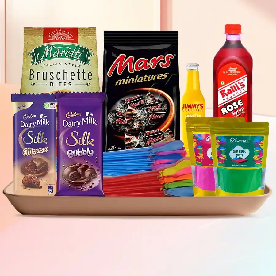 Playful Holi Special Gift Hamper featuring Bruschetta Chips, Cadbury Silk Bubbly, Mars Mini Chocolate Pouch, Jimmys Cocktail, Rallis Rose Syrup, Herbal Gulal, and water balloons in a stylish tray.