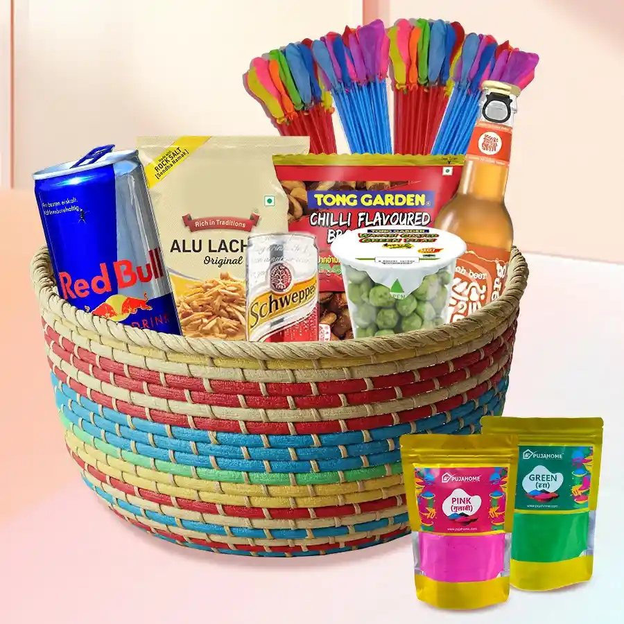 Colorful gift basket filled with snacks including Tong Garden Broad Beans, Alu Lachha, and drinks like Schweppes Ginger Ale and Coolberg Peach Drink, along with Holi colors and water balloons.