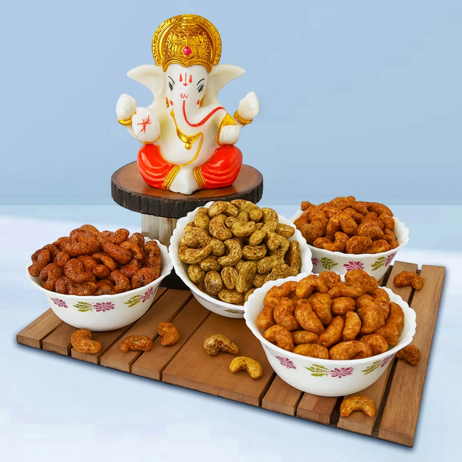 Alluring combo of flavored cashews in a gift box with a Lord Ganesh idol on top, featuring Cheese, Peri Peri, Pizza, and Barbecue flavored cashews.