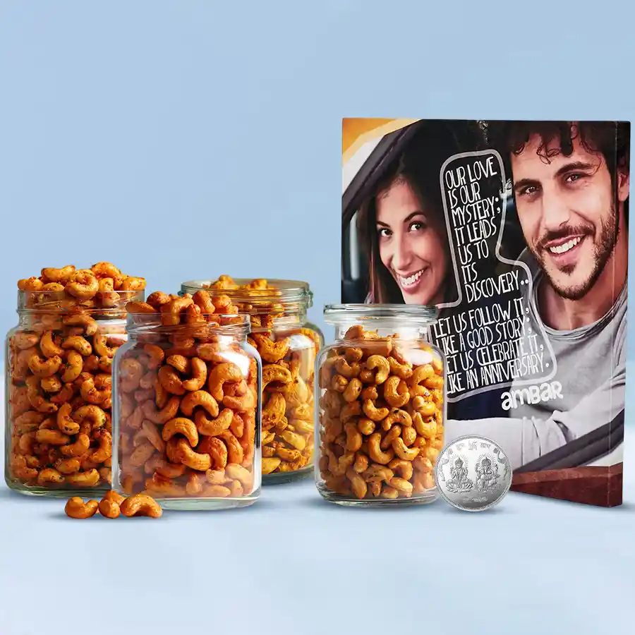 Crunchy flavored cashews in assorted flavors with a personalized photo wall canvas and a silver-plated Laxmi Ganesh coin, arranged as a festive Diwali gift.