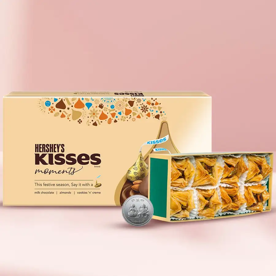 Ideal Diwali Combo featuring Pyramid Baklawa and Hershey's Kisses Moments with a Laxmi Ganesh Coin