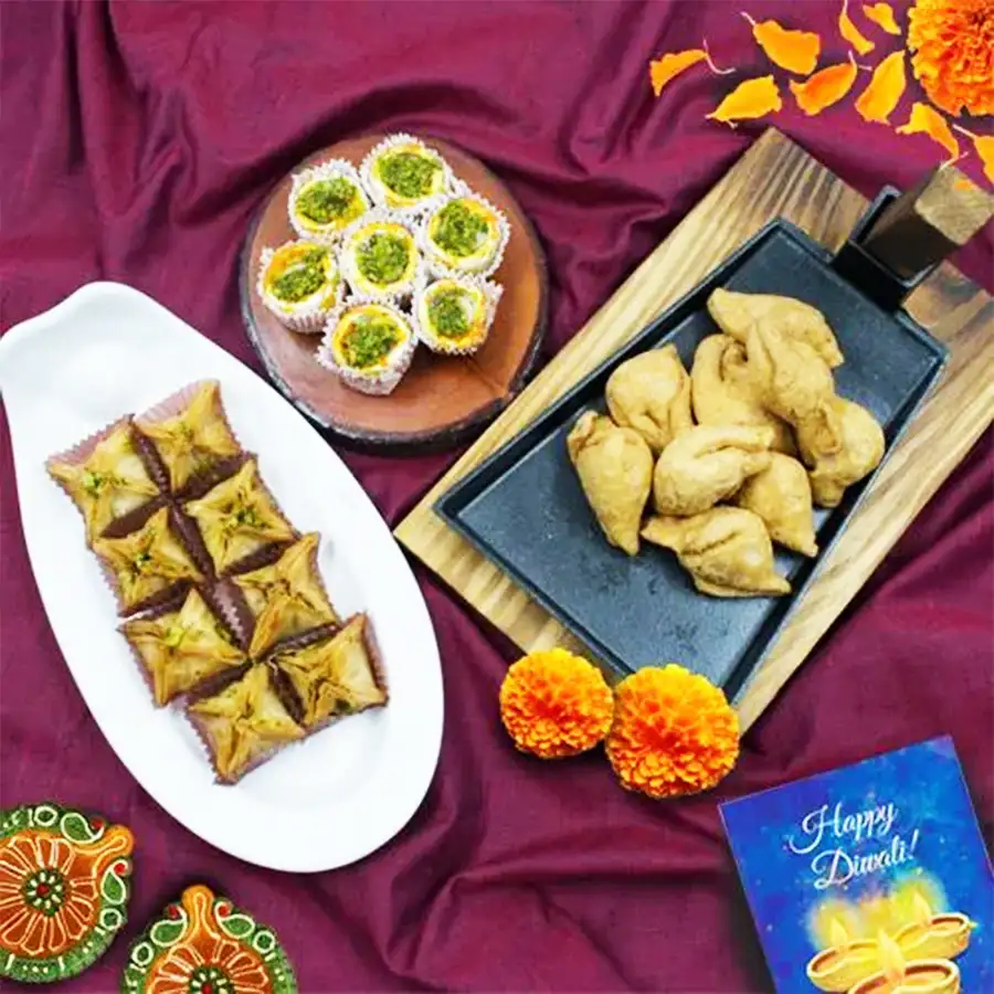 Irresistible Pyramid Baklava gift set featuring Pyramid Baklava, Haldiram Kaju Pista Flower, Haldiram Mini Samosa, and Laxmi-Ganesh Coin, perfect for Diwali celebrations.