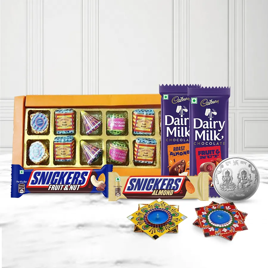 Delightful Chocolate Hamper with Dot Mandala Diyas and Ganesh Lakshmi coin, featuring handmade chocolates, Cadbury treats, and elegant gift packaging for Diwali celebrations.