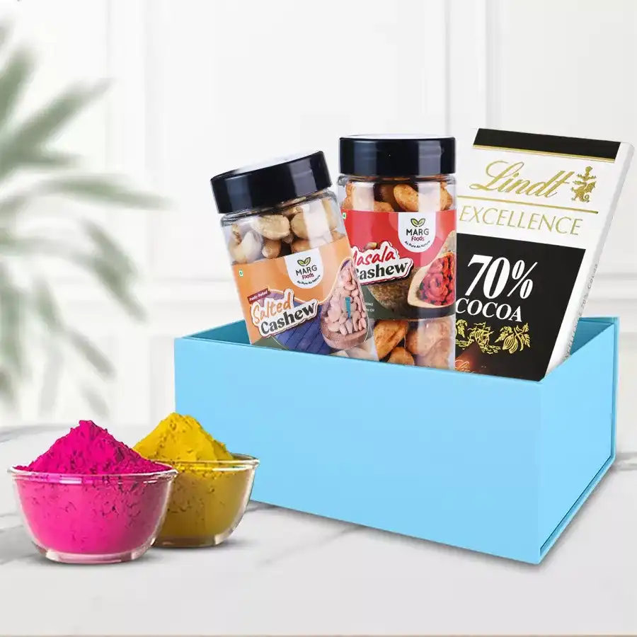 Gift box featuring Lindt chocolates, Masala nuts, and Herbal Gulal for Holi celebrations.