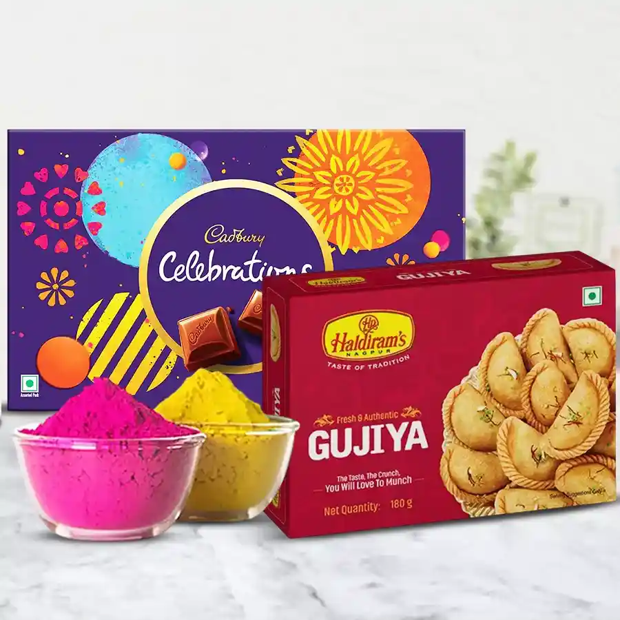 A colorful Holi gift combo featuring Haldiram Gujiya or Balushahi, an assortment of Cadbury chocolates, and two packs of Herbal Gulal.
