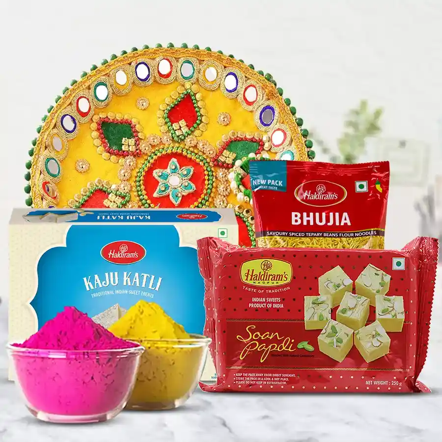 Pious Puja Thali with Haldiram sweets, snacks, and herbal Gulal, beautifully arranged for festive celebrations