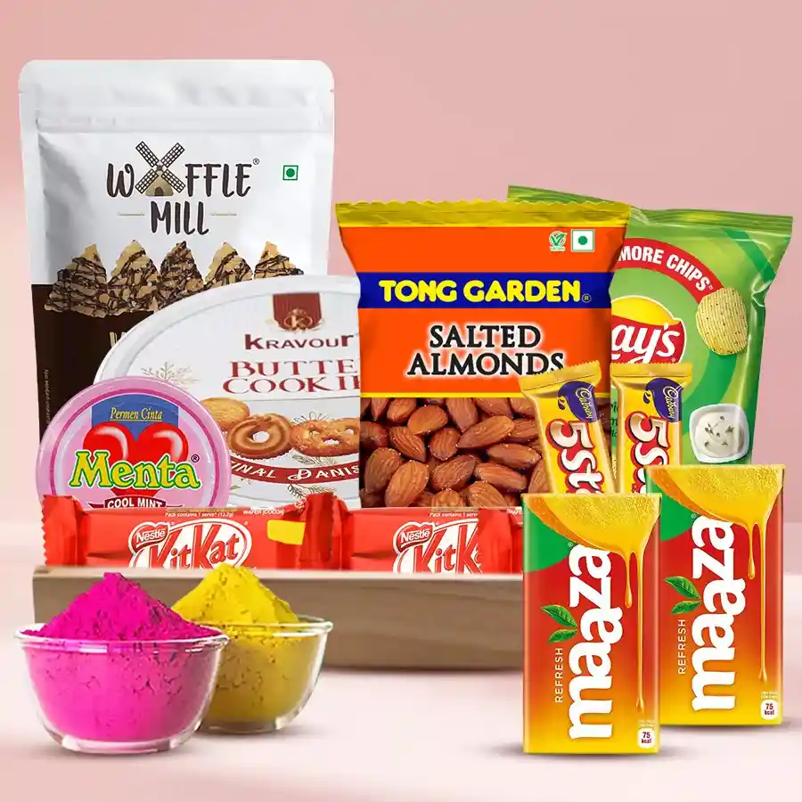 Gourmet delight tray with assorted snacks, sweets, herbal gulal, and drinks for Holi celebration, presented in a wooden tray