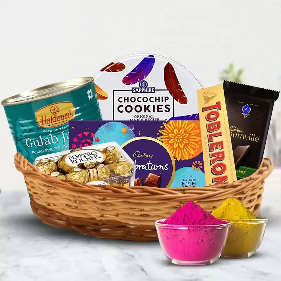 Delightful Holi gift basket featuring chocolate cookies, assorted sweets, and herbal gulal, arranged beautifully for the festival celebration.