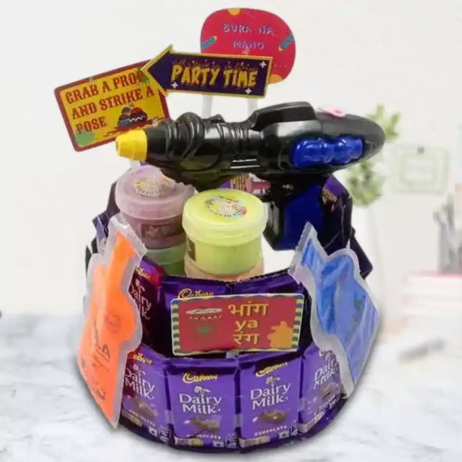 A vibrant Holi chocolates hamper featuring 30 Cadbury Dairy Milk chocolates, colorful Holi powders, a water gun, and playful Holi props.